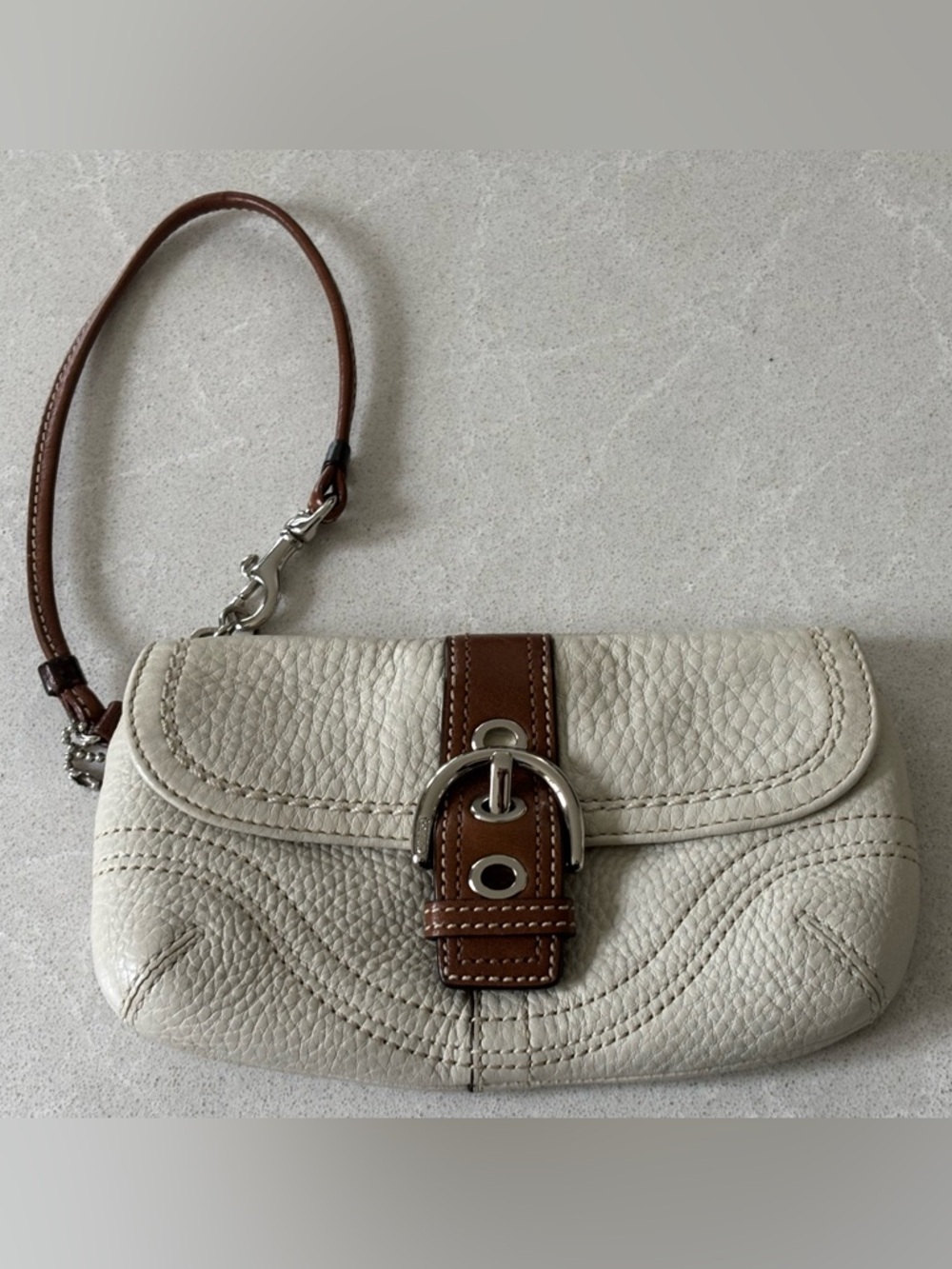 Coach Ivory and Brown SoHo Pebbled Leather Buckle Flap Closure Wristlet Wallet
